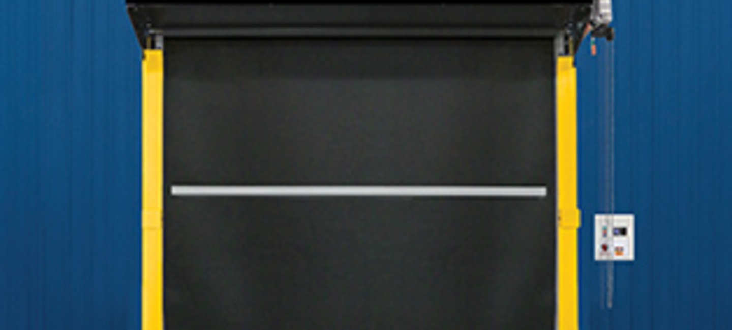 High Speed RapidFlex® door by Overhead Door™, featuring a springless design, suitable for large openings in commercial settings like warehouses and distribution facilities.